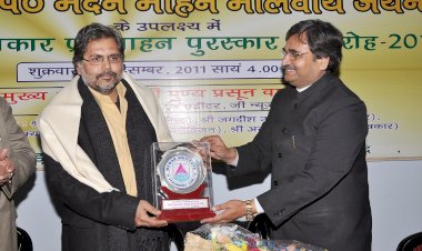 Awarded with  Sh. Punya Prasun Bajpai, Indian Journalist